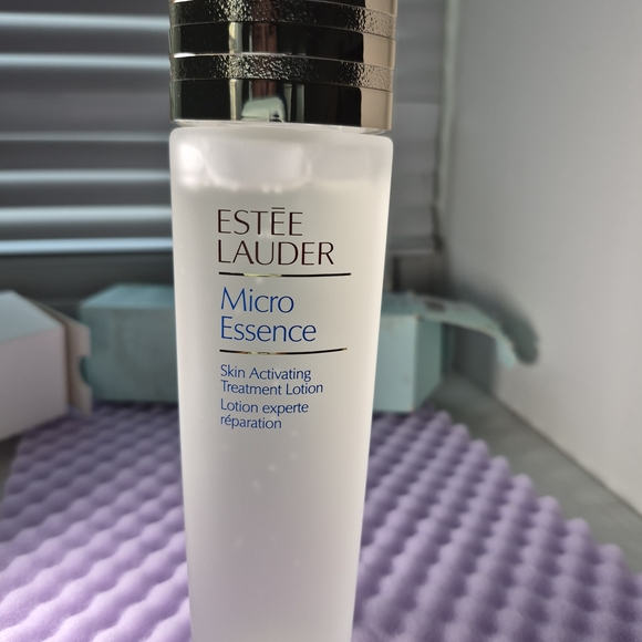 Estee Lauder Micro Essence Bottle with Silver Cap and Blue Label